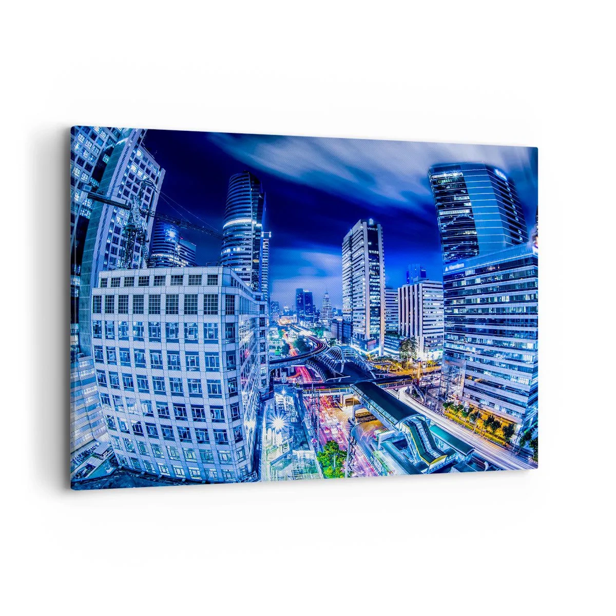 Impression sur toile - Image sur toile - Panorama nocturne de la ville avec gratte-ciels et lampadaires - 100x70cm - Rythmes de la ville nocturne - Décoration murale moderne pour le salon et la chambre ARTTOR