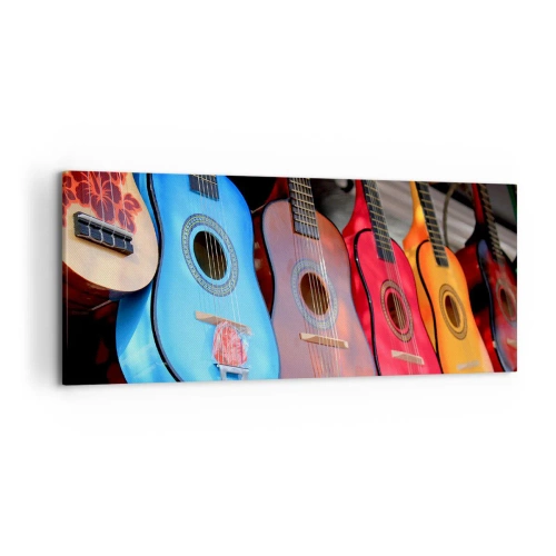 Impression sur toile - Image sur toile - Des guitares acoustiques colorées sont accrochées en rangée dans une exposition - 120x50cm - Ambiance latine - Décoration murale moderne pour le salon et la chambre ARTTOR