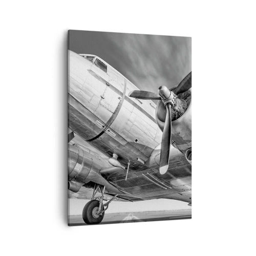 Impression sur toile - Image sur toile - Une image en noir et blanc d'un avion classique avec des détails structurels visibles. - 50x70cm - Toujours prêt à voler - Décoration murale moderne pour le salon et la chambre ARTTOR