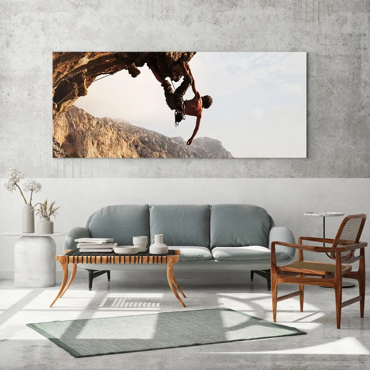Impression sur verre - Image sur verre - Un grimpeur sur une falaise abrupte dans les montagnes au soleil - 120x50cm - Le monde rétréci dans une main sur une coupe de rocher - Décoration murale moderne pour le salon et la chambre ARTTOR