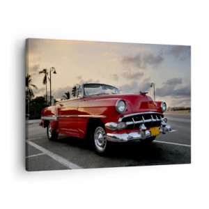 Impression sur toile - Image sur toile - Une décapotable classique rouge garée près des palmiers au crépuscule. - 70x50cm - La chaleur rouge des tropiques - Décoration murale moderne pour le salon et la chambre ARTTOR