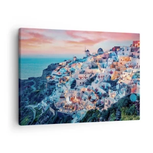 Impression sur toile - Image sur toile - Santorin au coucher du soleil avec des bâtiments blancs sur la colline - 70x50cm - Vos grandes vacances en Grèce - Décoration murale moderne pour le salon et la chambre ARTTOR