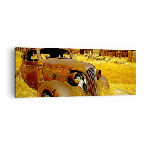 Impression sur toile - Image sur toile - Une vieille voiture rouillée sur fond de cabanes en bois abandonnées - 140x50cm - Repos bien mérité - Décoration murale moderne pour le salon et la chambre ARTTOR