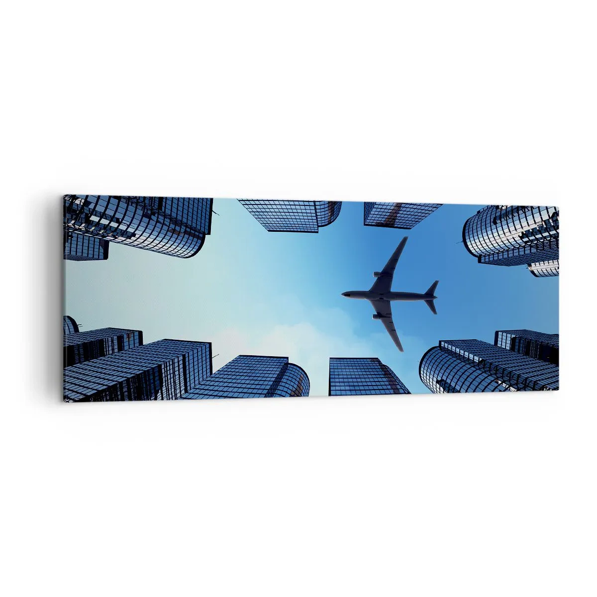 Impression sur toile - Image sur toile - Un avion survolant des gratte-ciels modernes dans le centre-ville. - 140x50cm - La vue depuis le ravin de verre - Décoration murale moderne pour le salon et la chambre ARTTOR