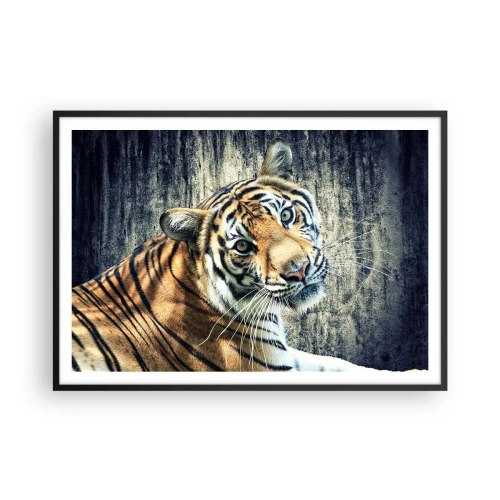 Affiche dans un cadre noir - Poster - Un tigre couché contre un mur à la texture rugueuse - 100x70cm - Portrait dans les flots de lumière - Décoration murale moderne pour le salon et la chambre ARTTOR