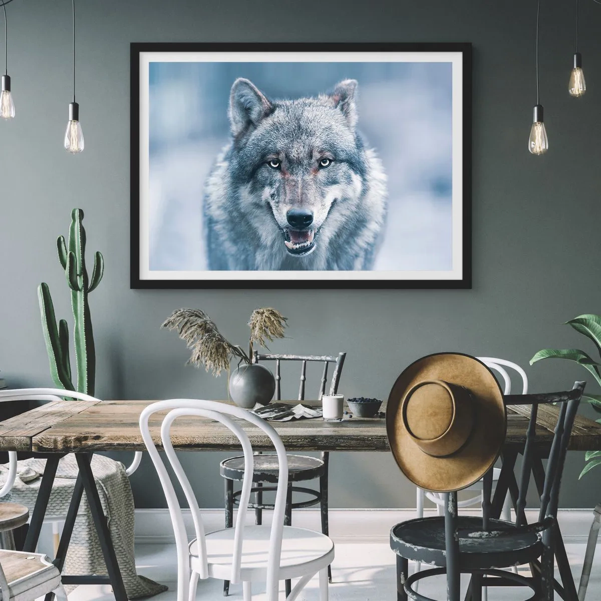 Affiche dans un cadre noir - Poster - Un loup au regard intense dans un paysage hivernal - 70x50cm - Relèverez-vous le défi ? - Décoration murale moderne pour le salon et la chambre ARTTOR
