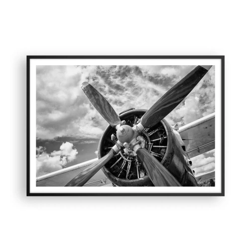 Affiche dans un cadre noir - Poster - Une photo en noir et blanc d'une hélice d'avion contre un ciel dynamique. - 100x70cm - Dompteur de ciel - Décoration murale moderne pour le salon et la chambre ARTTOR