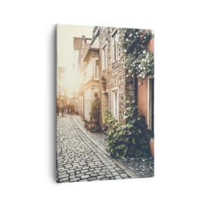 Impression sur toile - Image sur toile - Une charmante rue pavée de pierre et fleurie - 70x100cm - Allée de roses en lueur rose - Décoration murale moderne pour le salon et la chambre ARTTOR