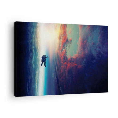 Impression sur toile - Image sur toile - Un astronaute flottant dans l'espace au-dessus d'une Terre colorée - 70x50cm - Affronter l'univers - Décoration murale moderne pour le salon et la chambre ARTTOR
