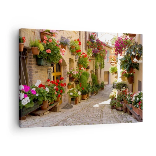 Impression sur toile - Image sur toile - Une rue avec des pots de fleurs et des murs de pierre - 70x50cm - Une inondation de fleurs  - Décoration murale moderne pour le salon et la chambre ARTTOR
