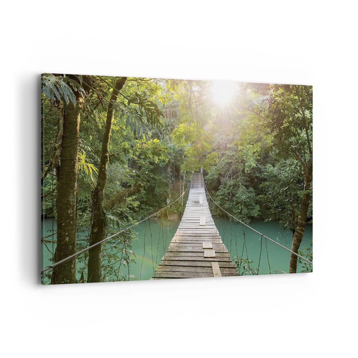 Impression sur toile - Image sur toile - Un pont suspendu dans une forêt tropicale illuminée par la lumière du soleil. - 120x80cm - De l'eau azur à la forêt azur - Décoration murale moderne pour le salon et la chambre ARTTOR