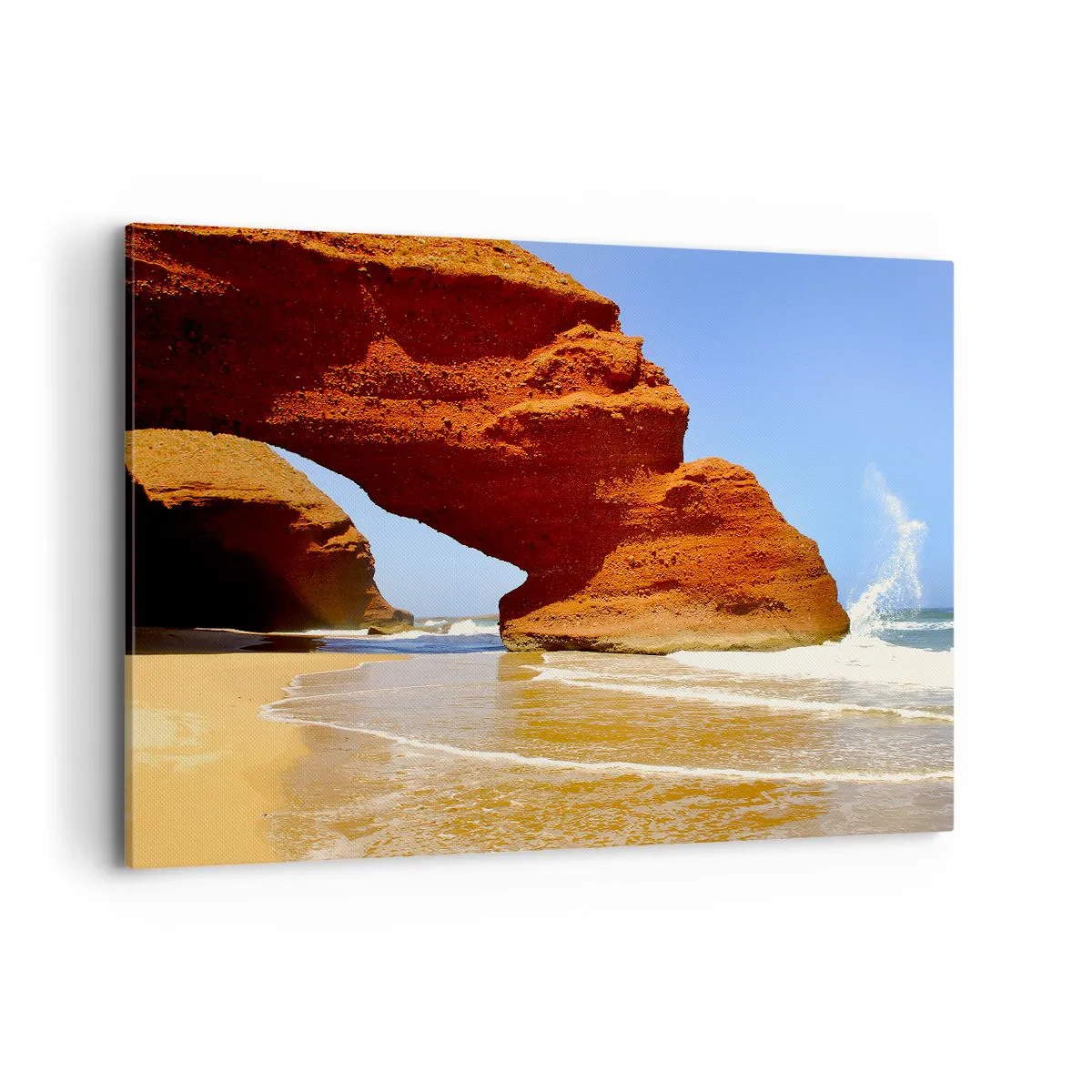 Impression sur toile - Image sur toile - Une arche rocheuse naturelle sur une plage avec un ciel bleu et des vagues - 100x70cm - L'eau et le vent depuis des milliers d'années - Décoration murale moderne pour le salon et la chambre ARTTOR