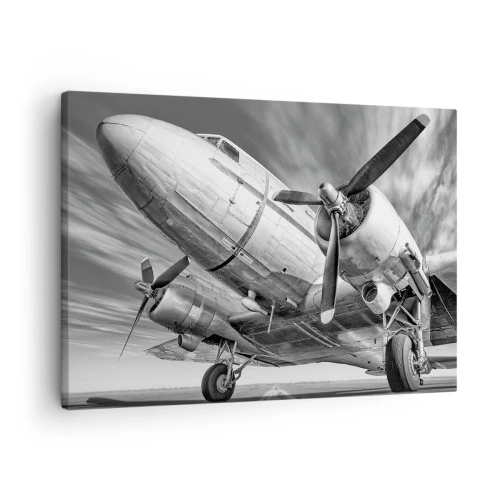 Impression sur toile - Image sur toile - Une image en noir et blanc d'un avion classique avec des détails structurels visibles. - 70x50cm - Toujours prêt à voler - Décoration murale moderne pour le salon et la chambre ARTTOR