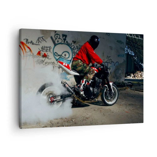 Impression sur toile - Image sur toile - Un motard effectue un drift spectaculaire dans un bâtiment abandonné couvert de graffitis. - 70x50cm - Pourchassez moi! - Décoration murale moderne pour le salon et la chambre ARTTOR