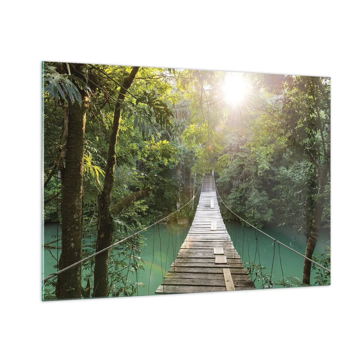Impression sur verre - Image sur verre - Un pont suspendu dans une forêt tropicale illuminée par la lumière du soleil. - 100x70cm - De l'eau azur à la forêt azur - Décoration murale moderne pour le salon et la chambre ARTTOR