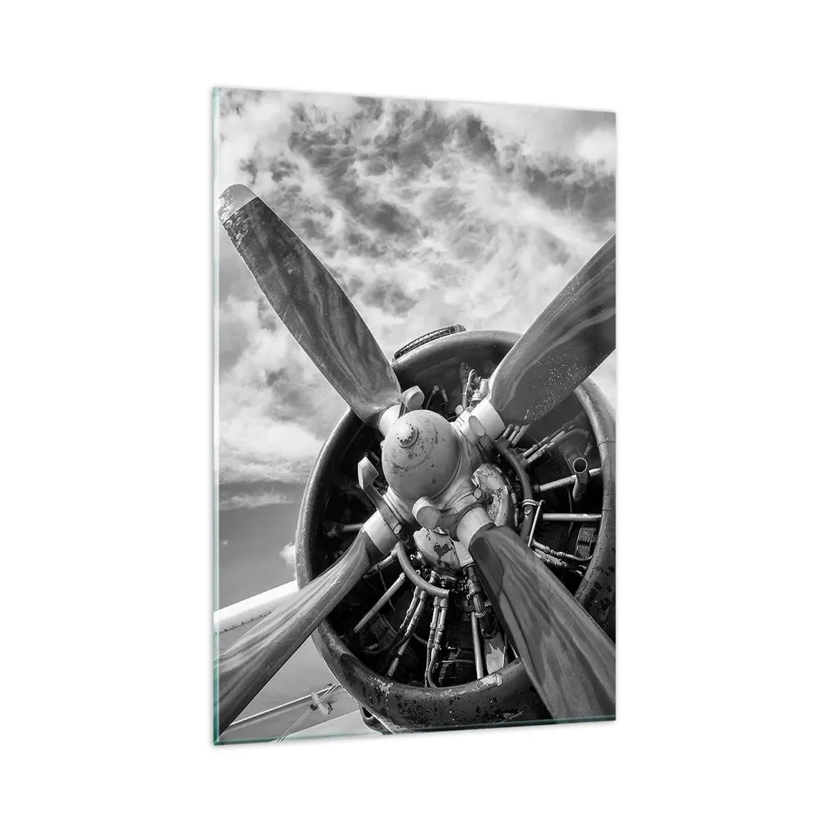 Impression sur verre - Image sur verre - Une photo en noir et blanc d'une hélice d'avion contre un ciel dynamique. - 80x120cm - Dompteur de ciel - Décoration murale moderne pour le salon et la chambre ARTTOR