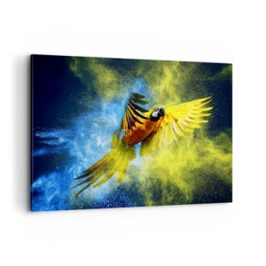 Impression sur toile - Image sur toile - Un perroquet en vol sur fond d'explosions colorées de jaune et de bleu. - 100x70cm - Dans la poussière bleue et dorée - Décoration murale moderne pour le salon et la chambre ARTTOR