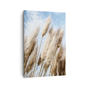 Impression sur toile - Image sur toile - Herbes de pampa délicates contre un ciel bleu avec des nuages légers - 70x100cm - Caresse ensoleillée et venteuse - Décoration murale moderne pour le salon et la chambre ARTTOR