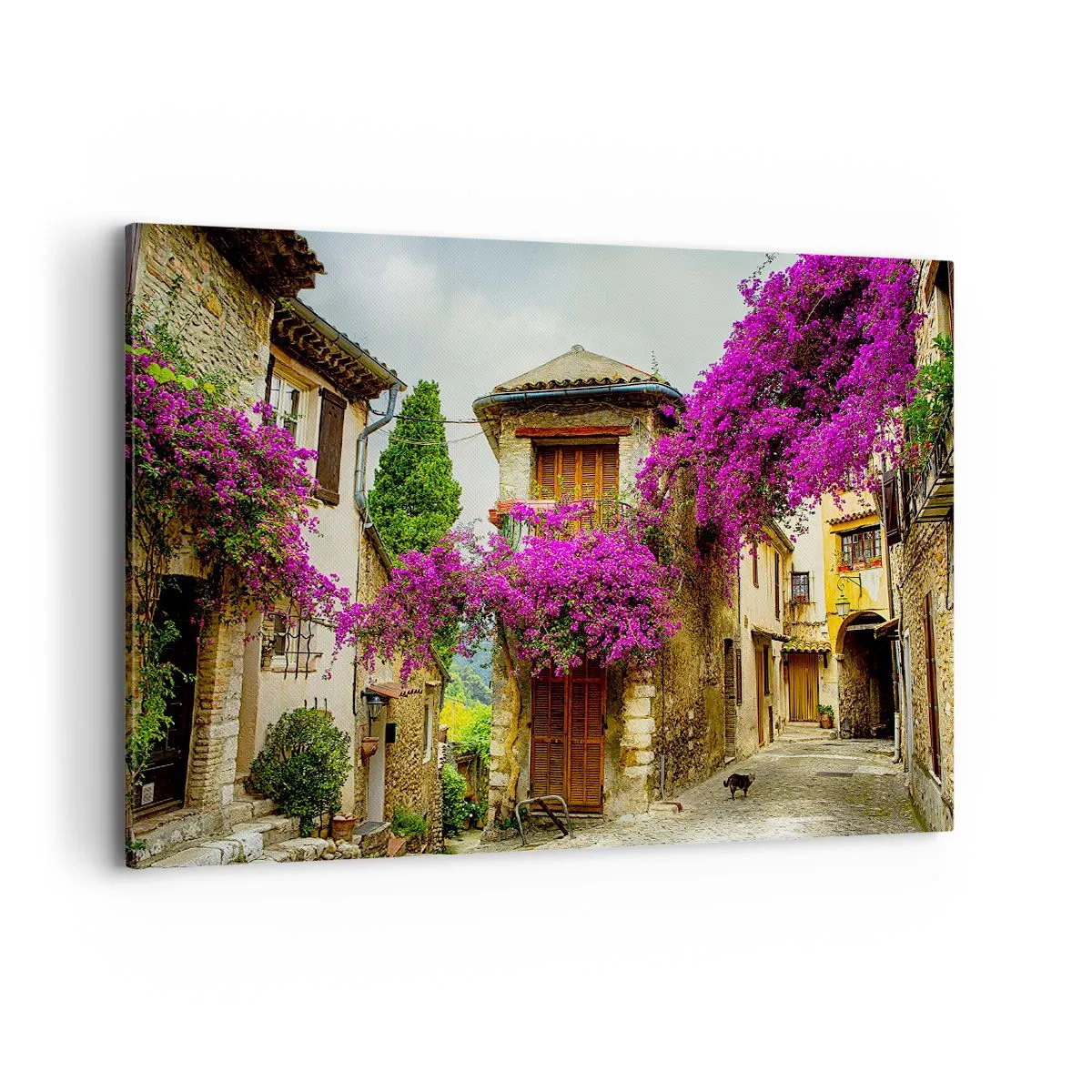 Impression sur toile - Image sur toile - Une rue en pierre avec des fleurs roses et des maisons - 100x70cm - Sous un dais fleuri - Décoration murale moderne pour le salon et la chambre ARTTOR