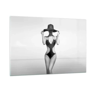 Impression sur verre - Image sur verre - Une femme en maillot de bain noir et chapeau contre la mer - 120x80cm - Mon prénom? Élégance - Décoration murale moderne pour le salon et la chambre ARTTOR