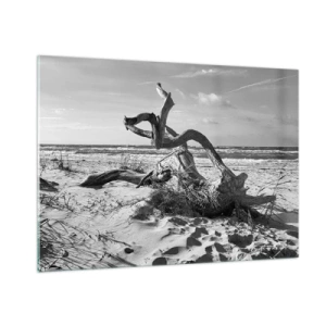 Impression sur verre - Image sur verre - Un paysage en noir et blanc avec une branche tombée sur une plage en bord de mer. - 100x70cm - Sculpture marine - Décoration murale moderne pour le salon et la chambre ARTTOR