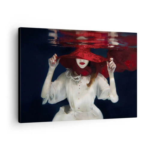 Impression sur toile - Image sur toile - Une femme avec un chapeau rouge immergée dans l'eau - 70x50cm - Femme mystérieuse - Décoration murale moderne pour le salon et la chambre ARTTOR