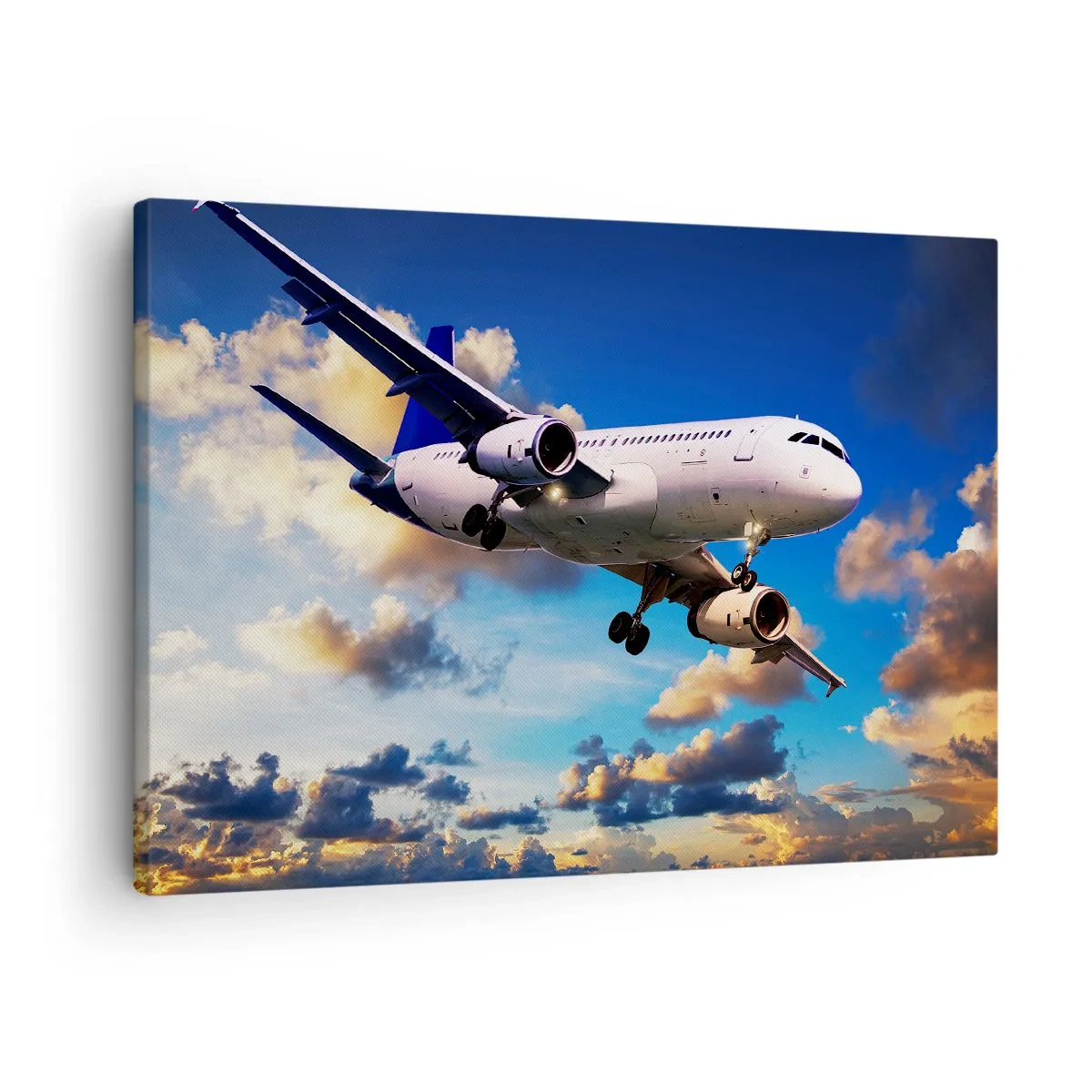 Impression sur toile - Image sur toile - Un avion de ligne contre les nuages au coucher du soleil - 70x50cm - Un voyage en blanc et bleu ciel - Décoration murale moderne pour le salon et la chambre ARTTOR