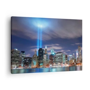 Impression sur toile - Image sur toile - Panorama nocturne de la ville avec deux faisceaux lumineux dans le ciel - 70x50cm - Atteindre le ciel avec la lumière - Décoration murale moderne pour le salon et la chambre ARTTOR