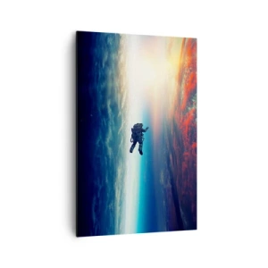 Impression sur toile - Image sur toile - Un astronaute flottant dans l'espace au-dessus d'une Terre colorée - 80x120cm - Affronter l'univers - Décoration murale moderne pour le salon et la chambre ARTTOR