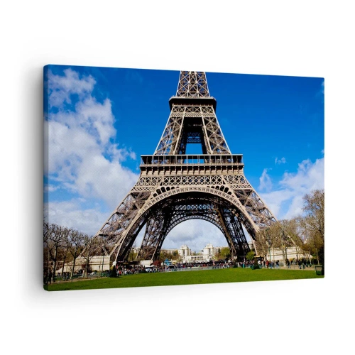 Impression sur toile - Image sur toile - La Tour Eiffel sur fond de ciel bleu et de parc verdoyant - 70x50cm - Tout Paris à ses pieds - Décoration murale moderne pour le salon et la chambre ARTTOR