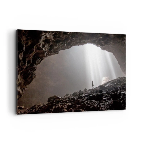 Impression sur toile - Image sur toile - Une figure dans une grotte éclairée par des rayons de lumière - 120x80cm - Grotte lumineuse - Décoration murale moderne pour le salon et la chambre ARTTOR