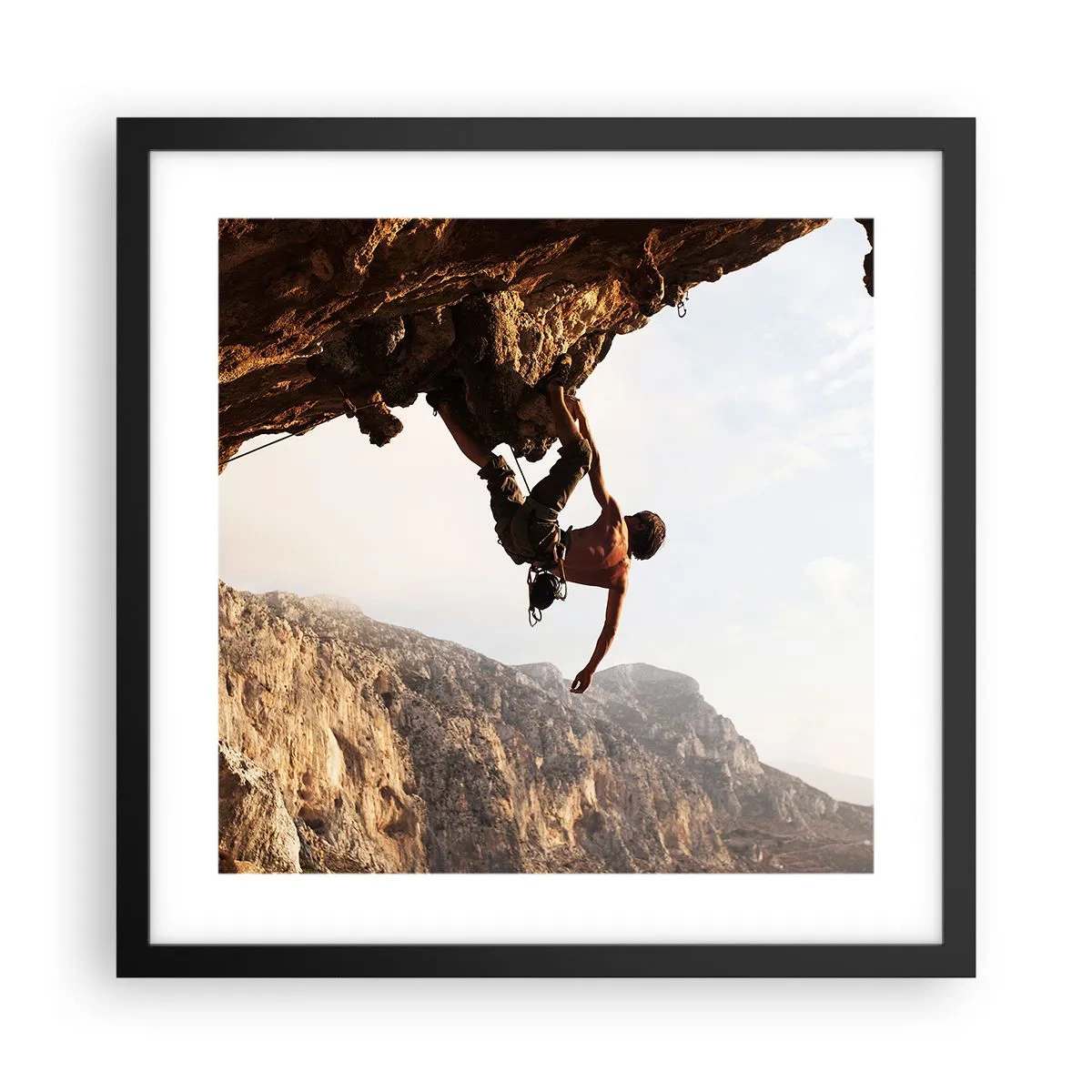 Affiche dans un cadre noir - Poster - Le monde rétréci dans une main sur une coupe de rocher - 40x40 cm