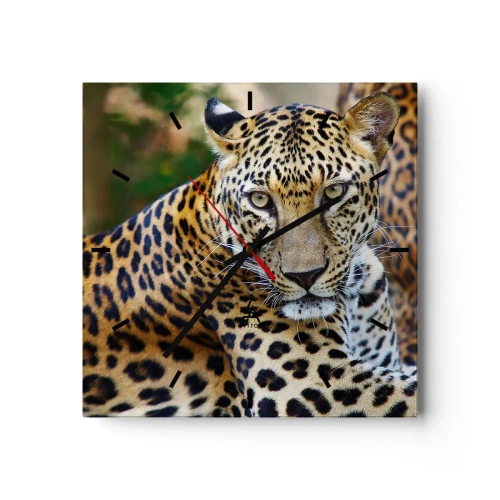 Horloge murale - Pendule murale - Jaguar au repos dans un environnement naturel avec un fond vert. - 30x30cm - Sauvage et calme - Décoration murale moderne pour le salon et la chambre ARTTOR