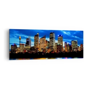 Impression sur toile - Image sur toile - Panorama de la ville nocturne avec des gratte-ciel illuminés au-dessus de l'eau - 140x50cm - Une nuit de lumières et de couleurs - Décoration murale moderne pour le salon et la chambre ARTTOR