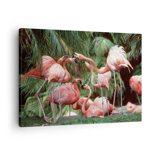 Impression sur toile - Image sur toile - Un groupe de flamants roses dans un cadre tropical entouré de palmiers - 70x50cm - Potins d'après-midi - Décoration murale moderne pour le salon et la chambre ARTTOR