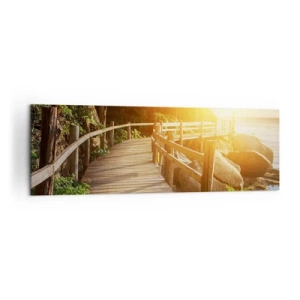 Impression sur toile - Image sur toile - Un pont en bois au milieu de la verdure menant à la mer sous les rayons du soleil - 160x50cm - Un autre tour, un autre miracle - Décoration murale moderne pour le salon et la chambre ARTTOR