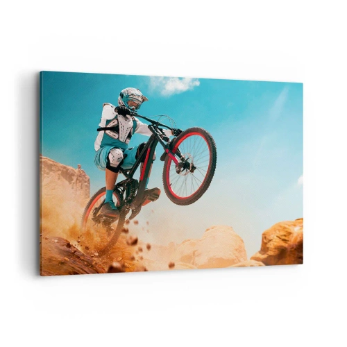 Impression sur toile - Image sur toile - Un vététiste effectue un saut sur fond de rochers - 100x70cm - Démon de la folie du vélo - Décoration murale moderne pour le salon et la chambre ARTTOR
