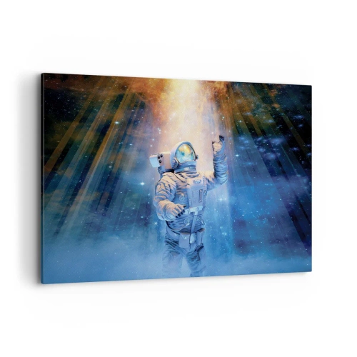 Impression sur toile - Image sur toile - Un astronaute à la lumière d'une explosion cosmique pleine d'étoiles - 120x80cm - Enfin arrivé - Décoration murale moderne pour le salon et la chambre ARTTOR