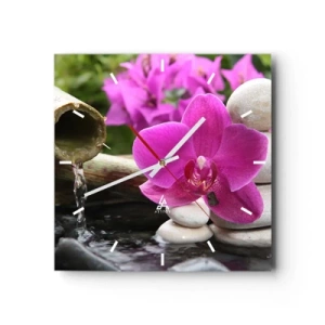 Horloge murale - Pendule murale - Orchidée violette, pierres et bambou avec de l'eau dans un cadre relaxant - 30x30cm - Tu te reposes déjà - Décoration murale moderne pour le salon et la chambre ARTTOR