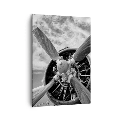 Impression sur toile - Image sur toile - Une photo en noir et blanc d'une hélice d'avion contre un ciel dynamique. - 50x70cm - Dompteur de ciel - Décoration murale moderne pour le salon et la chambre ARTTOR