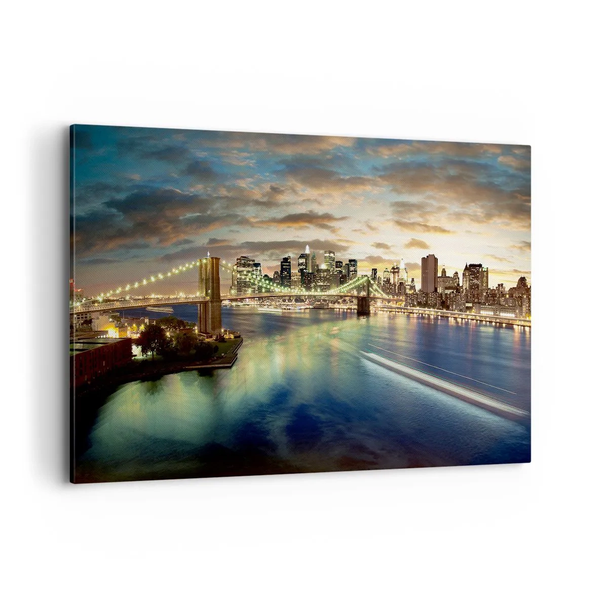 Impression sur toile - Image sur toile - Un pont illuminé avec la ville en arrière-plan, avec des lumières reflétées dans l'eau. - 100x70cm - Une soirée lumineuse sur Manhattan - Décoration murale moderne pour le salon et la chambre ARTTOR