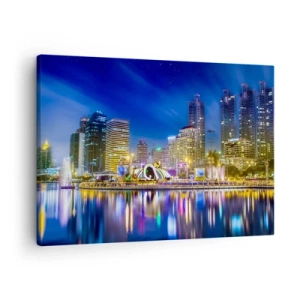 Impression sur toile - Image sur toile - Panorama nocturne de la ville avec les lumières reflétées sur l'eau - 70x50cm - Nuit arc-en-ciel de la métropole - Décoration murale moderne pour le salon et la chambre ARTTOR