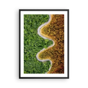 Affiche dans un cadre noir - Poster - Une route sinueuse à travers une forêt divisée en parties vertes et automnales - 50x70cm - Frontieres et differences - Décoration murale moderne pour le salon et la chambre ARTTOR