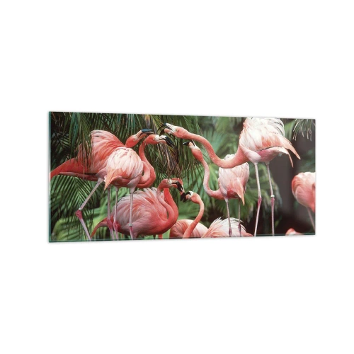 Impression sur verre - Image sur verre - Un groupe de flamants roses dans un cadre tropical entouré de palmiers - 120x50cm - Potins d'après-midi - Décoration murale moderne pour le salon et la chambre ARTTOR