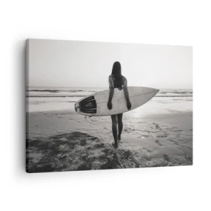 Impression sur toile - Image sur toile - Femme avec planche de surf sur la plage en noir et blanc - 70x50cm - Fille des vagues de la mer - Décoration murale moderne pour le salon et la chambre ARTTOR