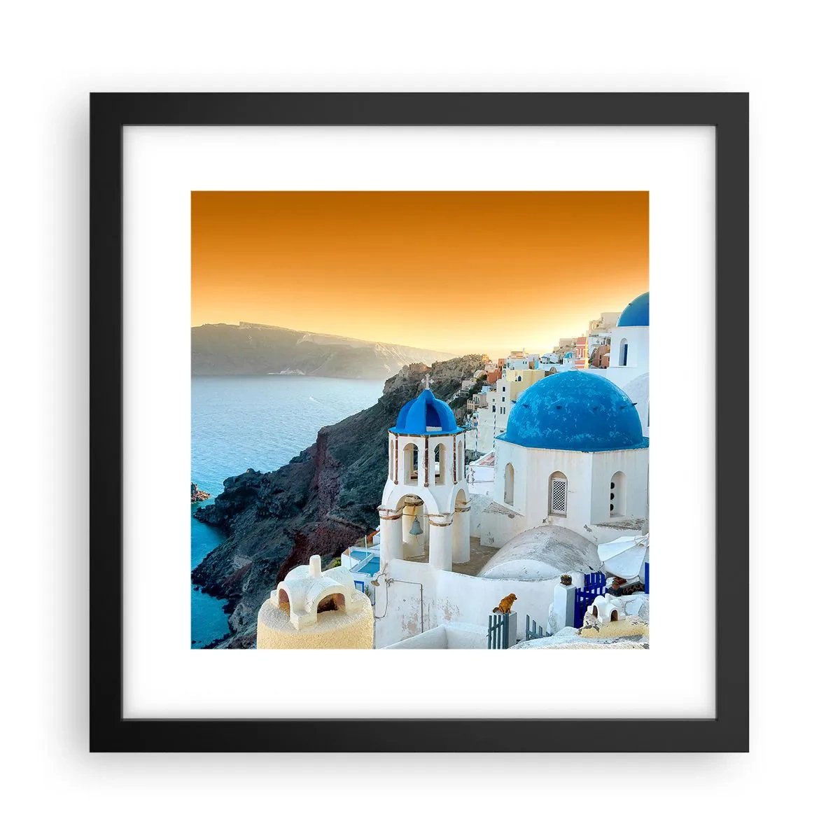 Affiche dans un cadre noir - Poster - Santorin - blotti contre les rochers - 30x30 cm