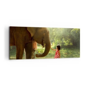 Impression sur toile - Image sur toile - Une fille en robe rouge touchant un éléphant dans la forêt. - 120x50cm - La force de l'amitié - Décoration murale moderne pour le salon et la chambre ARTTOR