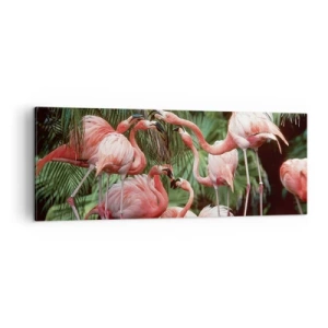 Impression sur toile - Image sur toile - Un groupe de flamants roses dans un cadre tropical entouré de palmiers - 140x50cm - Potins d'après-midi - Décoration murale moderne pour le salon et la chambre ARTTOR