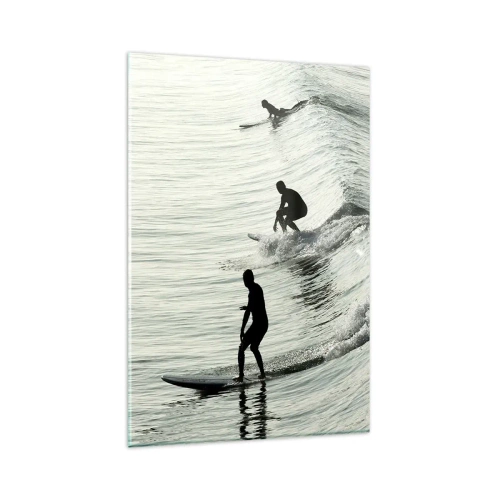Impression sur verre - Image sur verre - Surfeurs sur les vagues dans une photo monochrome - 80x120cm - A la rencontre de la vague - Décoration murale moderne pour le salon et la chambre ARTTOR