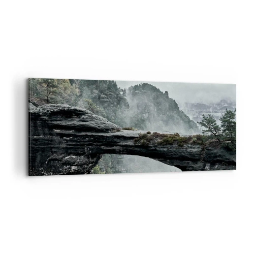 Impression sur toile - Image sur toile - Une arche de pierre entourée de montagnes brumeuses et de forêts - 120x50cm - L'aventure est sur le point de commencer - Décoration murale moderne pour le salon et la chambre ARTTOR